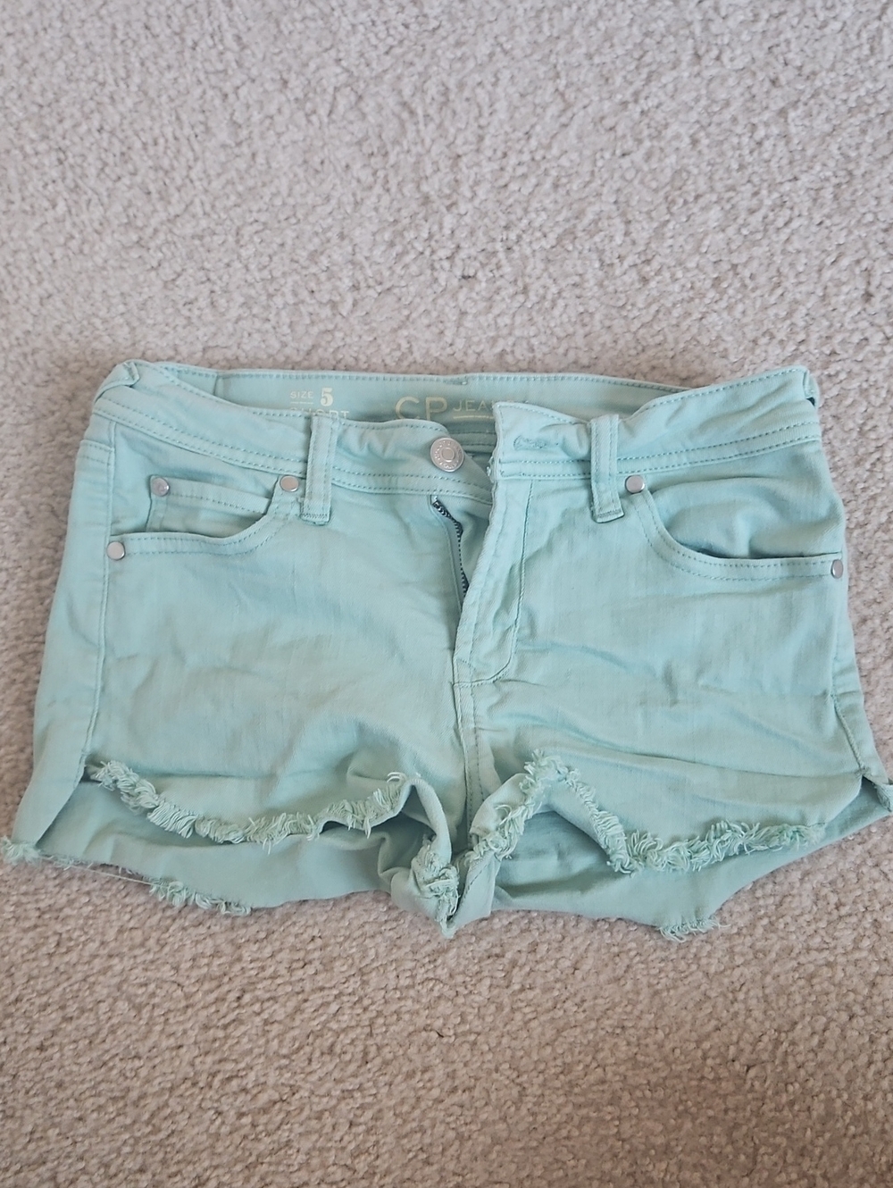 CP Jeans Womenโs Mint Green Frayed Hem Denim Shorts